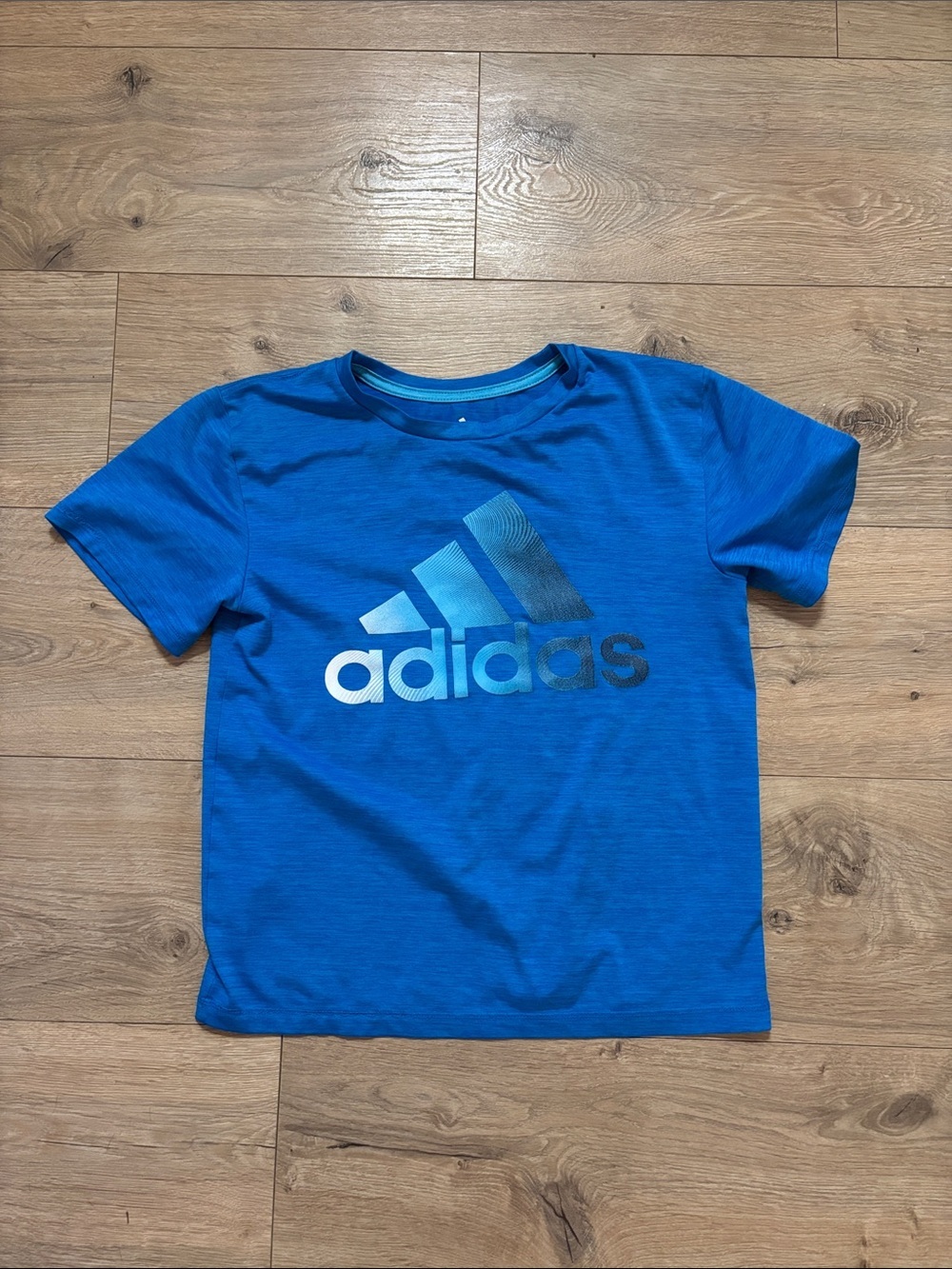 Adidas athletic boys shirt Fits more like an XS